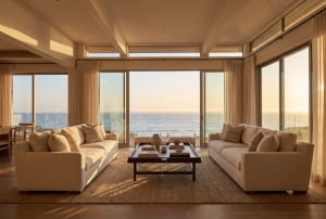 Alt: Spacious coastal living room with ocean view
