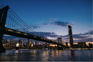 Professional movers carefully transporting items in a Manhattan penthouse