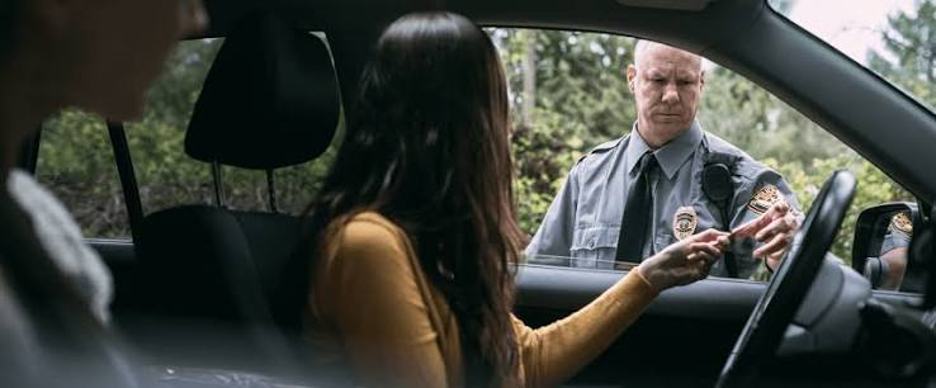 Driver speaking with a criminal defense attorney about a New Jersey DWI charge